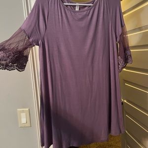 Purple blouse with sheer sleeve